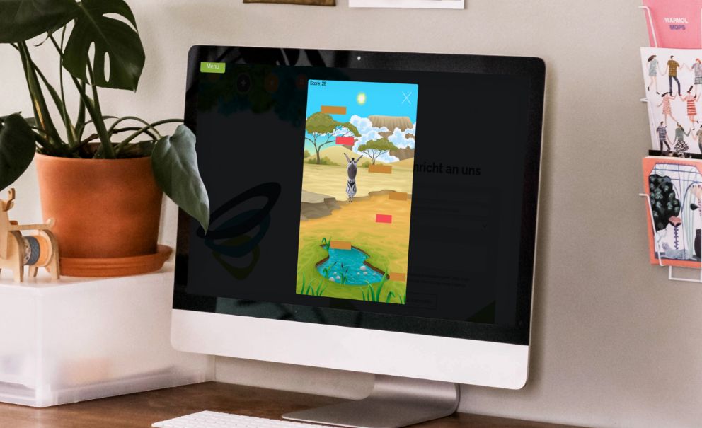 Darstellung des Jumping-Zebresel-Spiels auf einem PC-Monitor