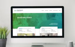 Darstellung der neumann-Hörakustik-Startseite auf einem PC-Monitor