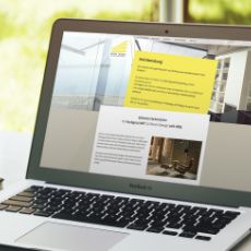Darstellung der Raumdesign-Elfriede-Hartenstein-Startseite auf einem Laptop-Bildschirm